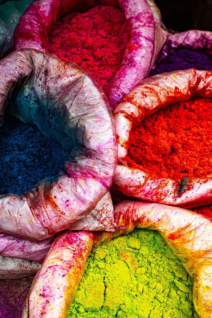 Bags filled with vibrant colored powders used for Indian Holi festival celebrations.